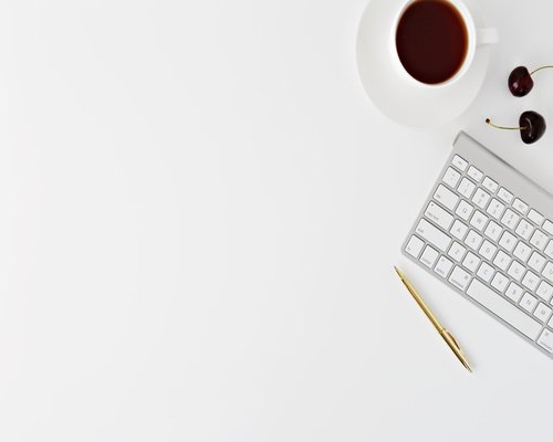 A clean, organized desk representing editorial focus