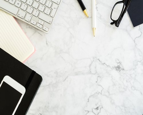 Person working from home at a comfortable desk setup in an apartment